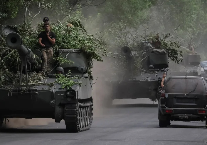 Ukrainian servicemen ride American 155 mm turreted self-propelled howitzers M109, amid Russia's attack on Ukraine, in Donetsk region, Ukraine June 13, 2022. (Gleb Garanich/Reuters)