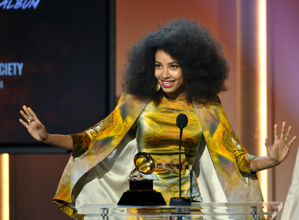 Esperanza Spalding accepts the jazz vocal album for "Radio Music Society" at the 55th annual Grammy Awards on Sunday, Feb. 10, 2013, in Los Angeles. (Photo by John Shearer/Invision/AP)