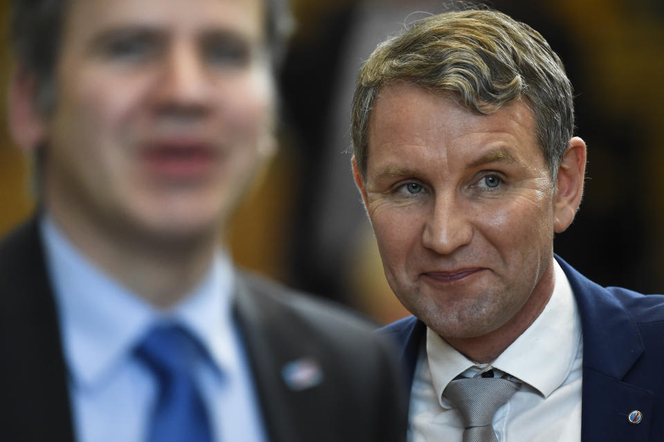 FILE - Bjoern Hoecke, the candidate of the far-right Alternative for Germany, or AfD party for the post of governor in the German state of Thuringia, attends elections at the state parliament in Erfurt, Germany, March 4, 2020. Millions of Germans have rallies all over the country for weeks in a row, attending events with slogans such as "Never Again is Now." The protesters have been alarmed by the AfD's policies and its growing popularity. (AP Photo/Jens Meyer, File)