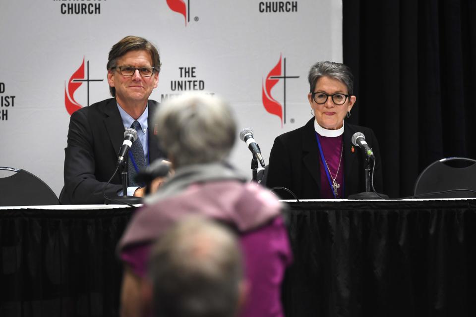 John Hill, chief executive of the General Board of Church and Society, and Bishop Rev. Sally Dyck discuss the yearslong process to overhaul the UMC Revised Social Principles during a news conference at the Charlotte Convention Center on April 30, 2024.