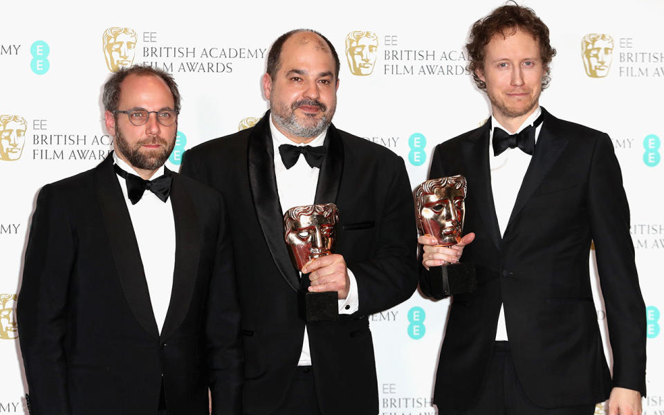 <p>Gabor Sipos, Gabor Rajna and Laszlo Nemes pose with their awards in the winners room (Credit: Chris Jackson/Getty Images) </p>