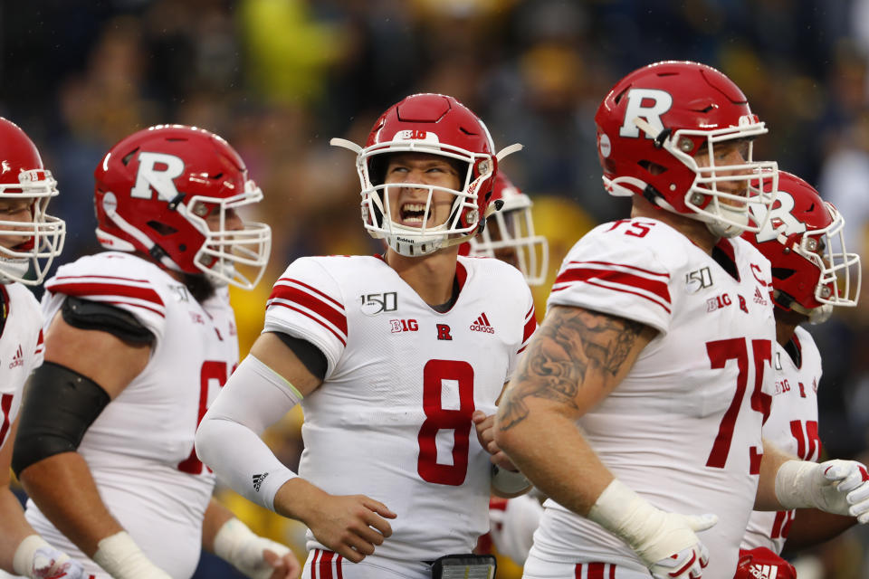 Rutgers quarterback Artur Sitkowski (8) reacts running to the bench in the first half of an NCAA college football game against Michigan in Ann Arbor, Mich., Saturday, Sept. 28, 2019. (AP Photo/Paul Sancya)