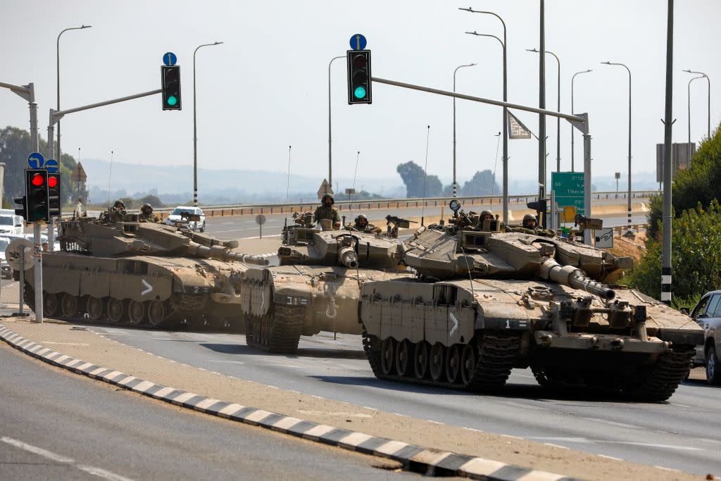  Israeli tanks rolling down the street. 