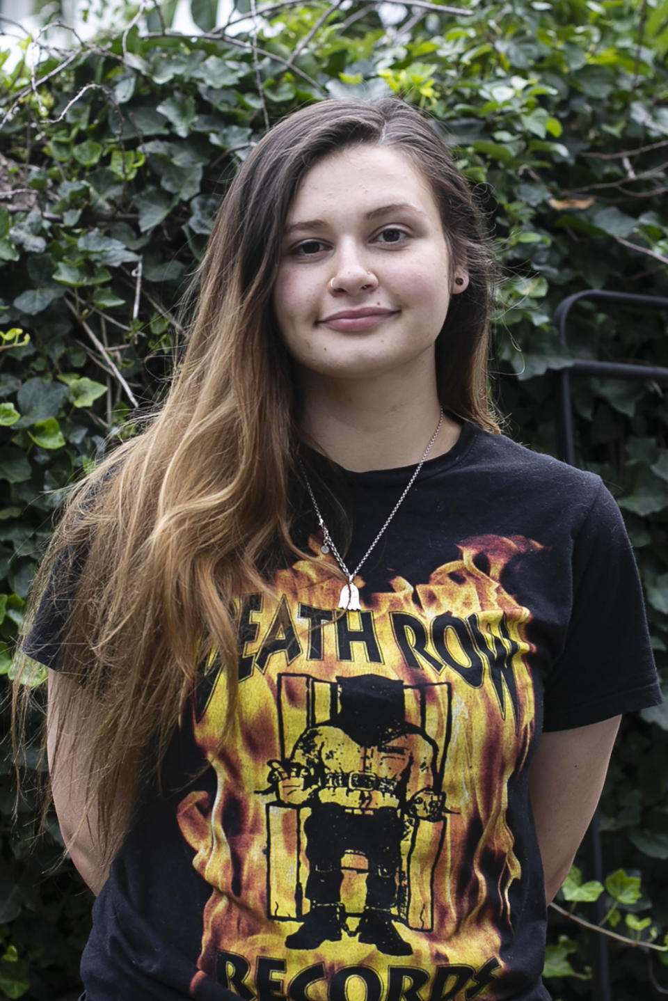 Kara Apuzzo poses for a portrait Thursday, Aug. 13, 2020, in New Haven, Conn. Educational disruptions forced by the coronavirus pandemic are hurting teenagers who also may need to work and help their families care for young kids. (AP Photo/Frank Franklin II)