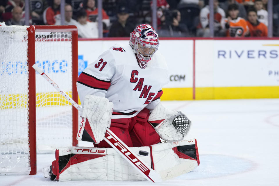 Carolina Hurricanes' Frederik Andersen blocks a shot during the second period of an NHL hockey game against the Philadelphia Flyers, Monday, Oct. 30, 2023, in Philadelphia. (AP Photo/Matt Slocum)