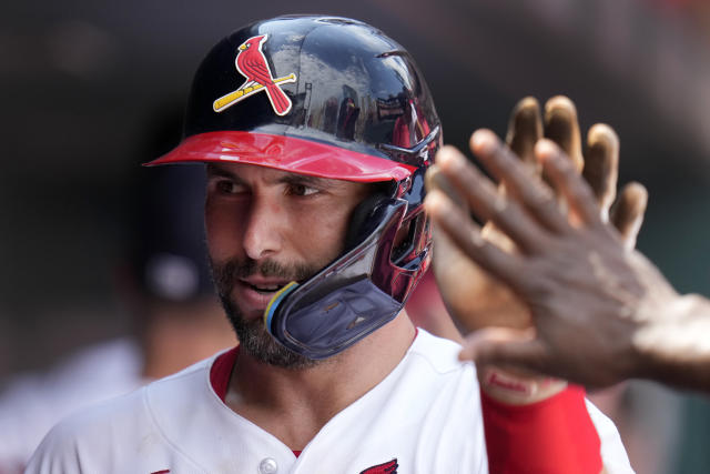 Alonso wears catcher's gear in the dugout 