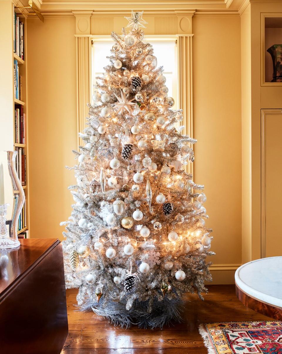 silver decorated Christmas tree in Martha's summer house library