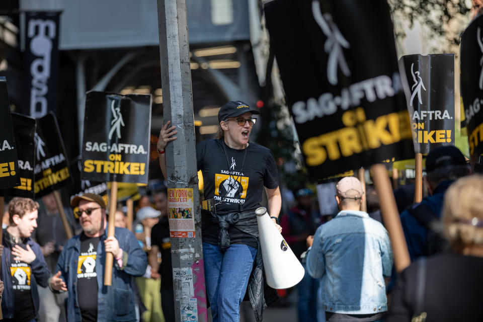 NEW YORK, UNITED STATES - 2023/10/12: SAG-AFTRA (Screen Actors Guild-American Federation of Television and Radio Artists) members and supporters gather at the picket line outside Netflix Headquarters. Members of SAG-AFTRA, Hollywood’s largest union representing actors and other media professionals, began their strike on July 14, 2023. (Photo by Michael Nigro/Pacific Press/LightRocket via Getty Images)