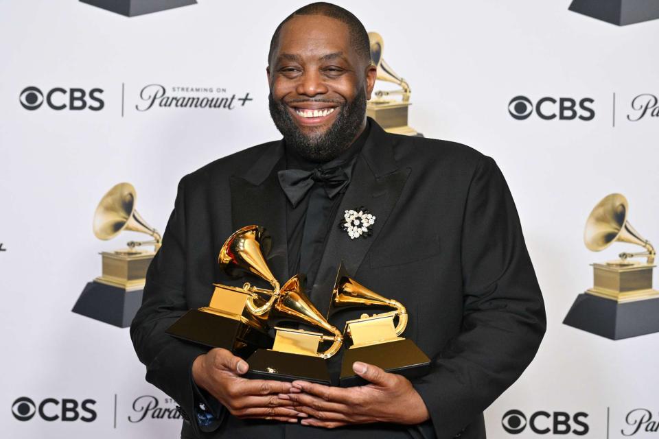 <p>Michael Buckner/Billboard via Getty</p> Killer Mike with his awards at the Grammys in Los Angeles on Feb. 4, 2024