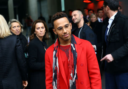 Formula One driver Lewis Hamilton of Britain arrives before Emporio Armani Autumn/Winter 2017 women collection show during Milan's Fashion Week in Milan, Italy February 24, 2017. REUTERS/Stefano Rellandini