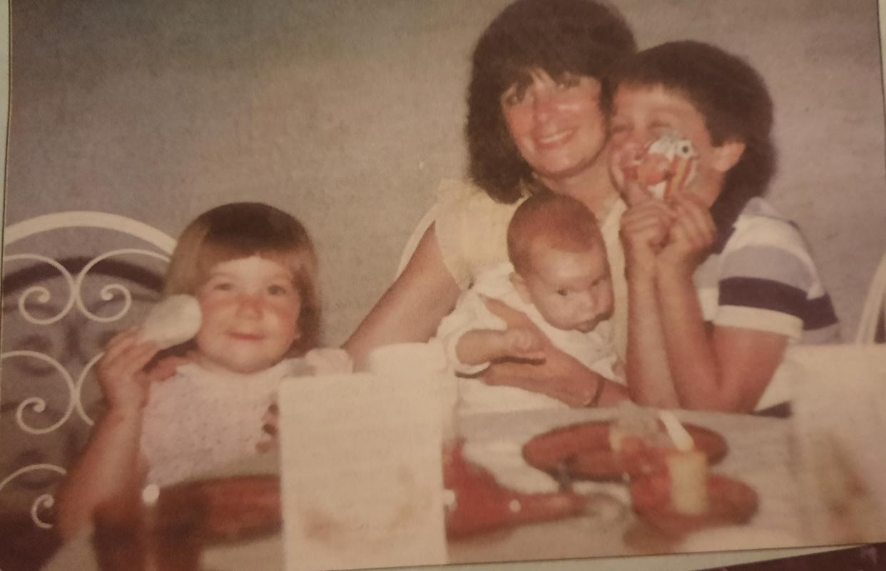 Glenda Hoskins with her three children in 1982
