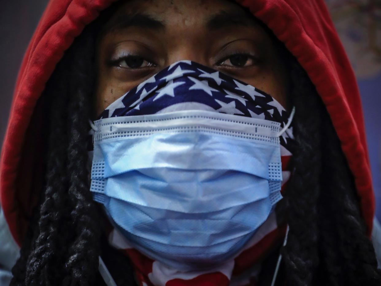 guy in a mask American flag bandana