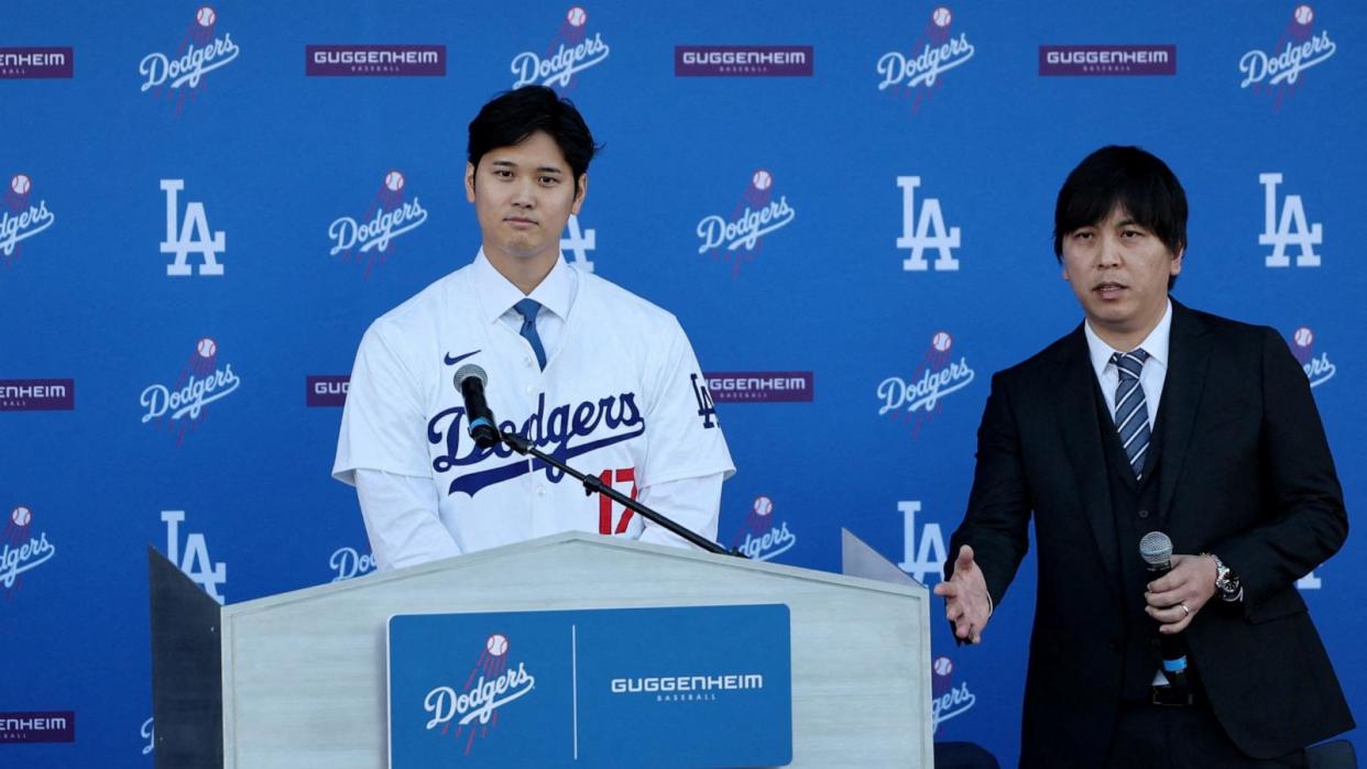 PHOTO: Shohei Ohtani with interpreter Ippei Mizuhara during a press conference at Dodger Stadium in Los Angeles, Dec. 14, 2023. (Aude Guerrucci/Reuters, FILE)