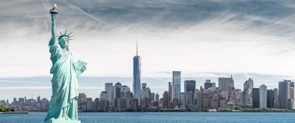 The Statue of Liberty with One World Trade Center background