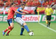 Italian forward Antonio Cassano (R) fights for the ball with Spanish defender Alvaro Arbeloa during the Euro 2012 championships football match Spain vs Italy on June 10, 2012 at the Gdansk Arena. AFP PHOTO / CHRISTOF STACHECHRISTOF STACHE/AFP/GettyImages