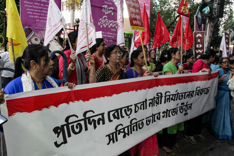 Activists demanding justice in the case of a veterinarian who was gang-raped and killed last week shout slogans during a protest in Kolkata, India, Thursday, Dec. 5, 2019. According to the most recent available official crime records, police registered 33,658 cases of rape in India in 2017 - an average of more than 90 every day. But the real figure is believed to be far higher as many women in India don’t report cases to police due to fear. Banner reads, "Protest against regular incidents of violence on women". (AP Photo/Bikas Das)