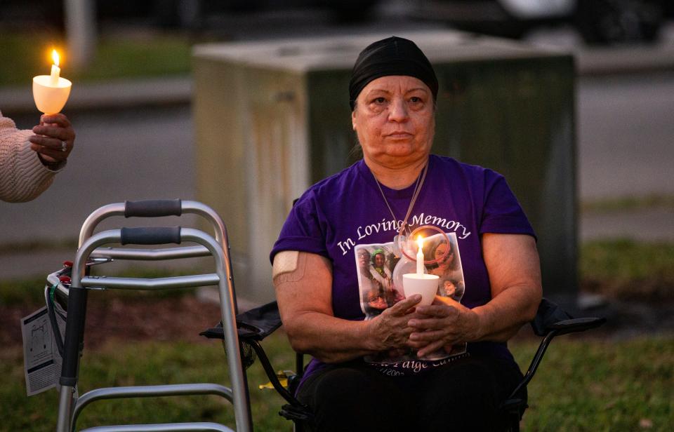 Olga Welch, the grandmother of Laura Candia, attends a candlelight vigil held by The Shelter for Abused Women & Children at the Immokalee Library on Thursday, Oct. 26, 2023. Candia was shot and killed on Sept. 16, 2023 in what authorities say was a domestic violence incident. The suspect, Michael Maldonado, is in jail. Welch was shot multiple times.