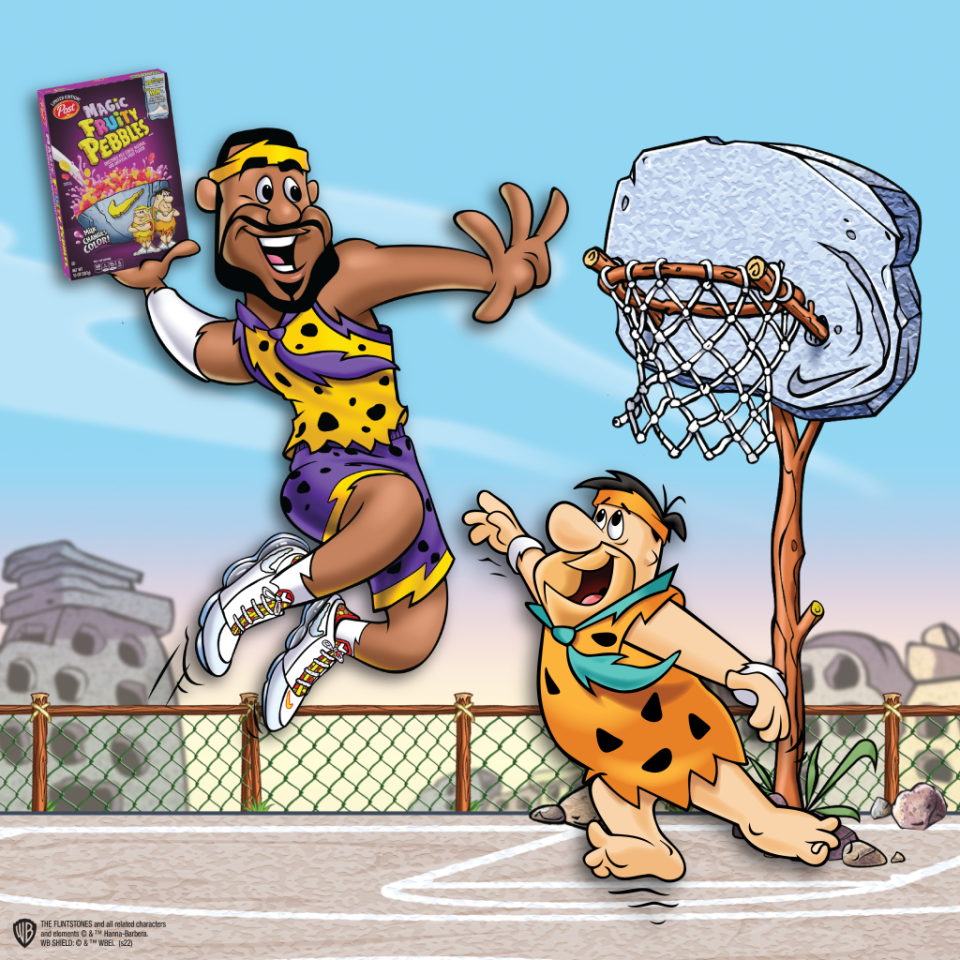 LeBron James and Fred Flintstone play basketball in a new campaign for the Nike LeBron James 19 Low Magic Fruity Pebbles sneakers. - Credit: Courtesy of Pebbles/Post Consumer Brands