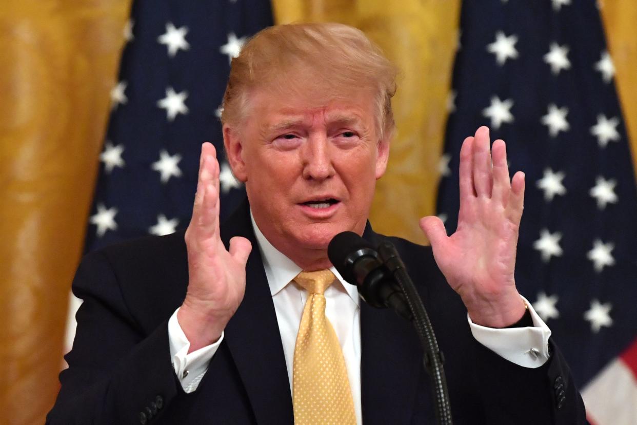 US President Donald Trump gestures as he speaks at the Presidential Social Media Summit at the White House in Washington, DC, on July 11, 2019. (Photo by Nicholas Kamm / AFP)        (Photo credit should read NICHOLAS KAMM/AFP/Getty Images)