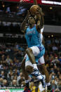 Charlotte Hornets guard Dwayne Bacon drives to the basket against the New York Knicks in the first half of an NBA basketball game in Charlotte, N.C., Tuesday, Jan. 28, 2020. (AP Photo/Nell Redmond)