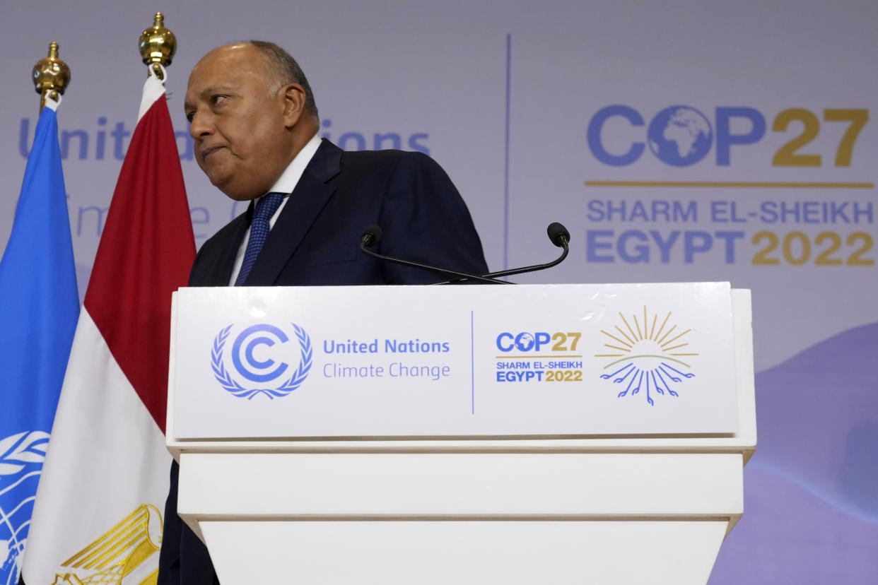 Sameh Shoukry, president of the COP27 climate summit, leaves after speaking at the summit, Saturday, Nov. 19, 2022, in Sharm el-Sheikh, Egypt. (AP Photo/Peter Dejong)