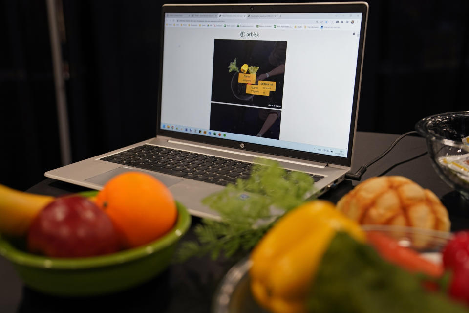 An image from the Orbisk food waste monitor is displayed on a computer during CES Unveiled, before the start of the CES tech show, Tuesday, Jan. 3, 2023, in Las Vegas. The device uses AI image recognition to track food as it is thrown away, displaying the data on a computer dashboard. (AP Photo/John Locher)