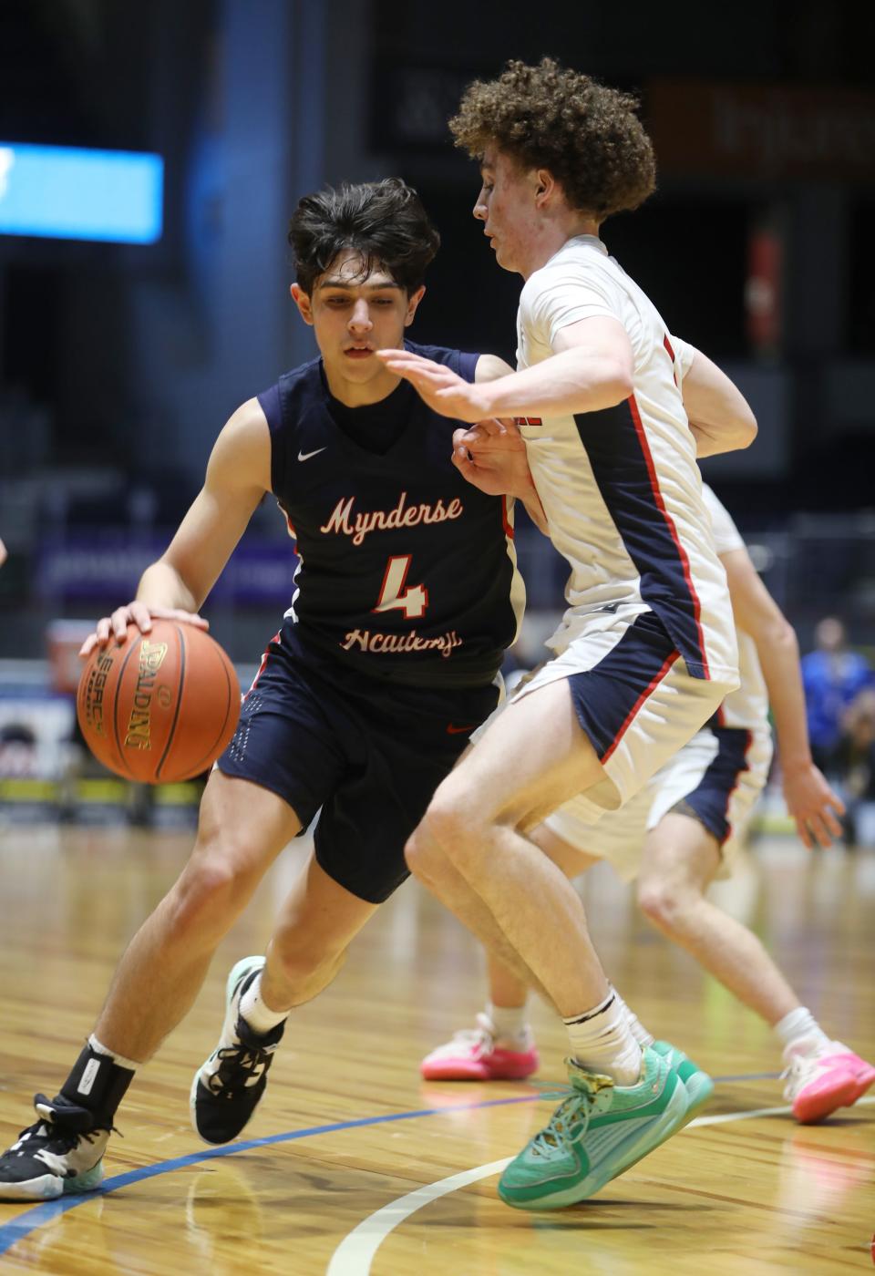 Mynderse Academy's Anthony Luffman tries to get by Hornell's Gennaro Picco.