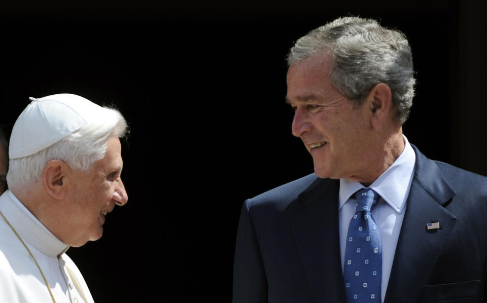 FILE - In this June 13, 2008, file photo, Pope Benedict XVI and US President George W. Bush walk in the Vatican Gardens during their meeting at the Vatican. President Obama is scheduled to meet Pope Francis for the first time on Thursday, March 27, 2014, at the Vatican. (AP Photo/Filippo Monteforte, pool)