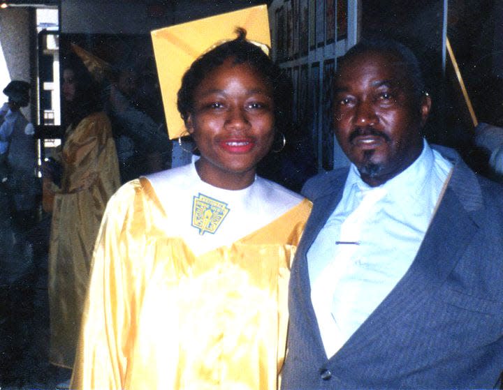 Columbus Dispatch Opinion and Community Engagement Editor Amelia Robinson pictured with her grandfather, Carl Ruth Robinson, at her high school graduation.
