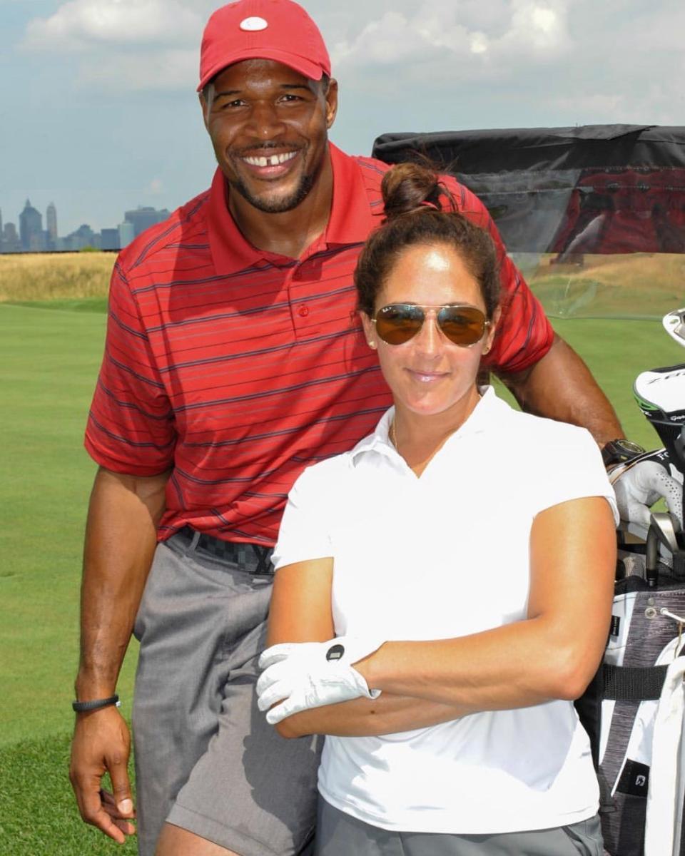 Constance Morini-Schwartz with Hall of Famer Michael Strahan.