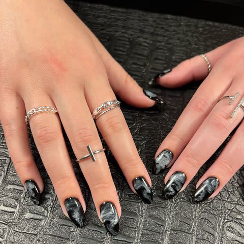 <p>Elle Gerstein Instagram</p> Black Marble nails