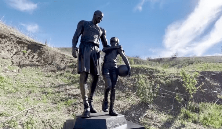 A statue showing Kobe and Gianna Bryant was erected on Jan. 26, 2022, at the Calabasas helicopter crash site where they died. (KTLA)