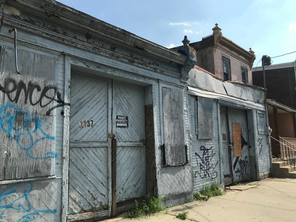 Curtis Jenkins III's body was discovered in the back of a garage on Liberty Street in Camden. On Wednesday morning, crews from the city were securing the building and clearing debris.