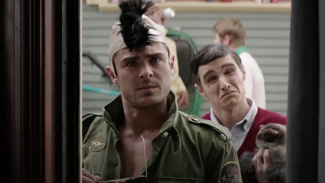  Teddy Sanders (Zac Efron) and Pete Regazolli (Dave Franco) impersonate Robert De Niro in Neighbors. 