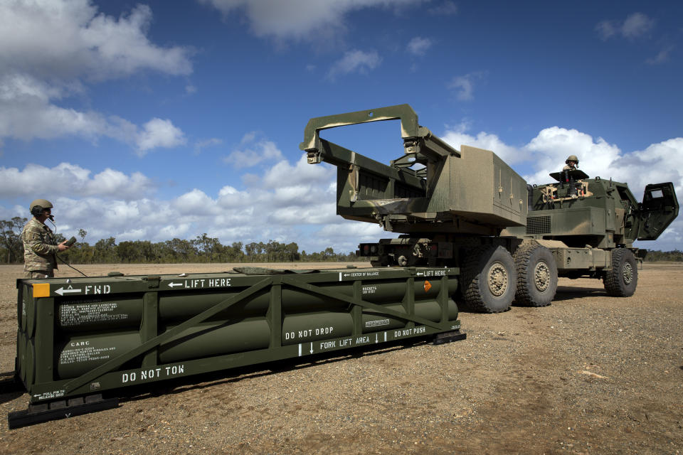 FILE - In this image provided by the U.S. Army, U.S. Army Sgt. Ian Ketterling, gunner for Alpha Battery, 1st Battalion, 3rd Field Artillery Regiment, 17th Field Artillery Brigade, prepares the crane for loading the Army Tactical Missile System (ATACMS) on to the High Mobility Artillery Rocket System (HIMARS) in Queensland, Australia, on July 26, 2023. Ukraine is having some success in halting Russia's new push along the northeast front weeks after the decision allowing the country to use U.S.-supplied weapons for limited strikes in Russian territory. But commanders say their hands are tied without the ability to use long-range guided missiles, such as ATACMS. (Sgt. 1st Class Andrew Dickson/U.S. Army via AP)