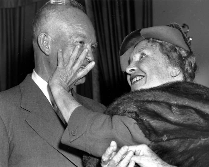 Helen Keller runs her fingers over the face of President Dwight Eisenhower during a visit to the White House in 1953. File Photo by Charles Corte/UPI