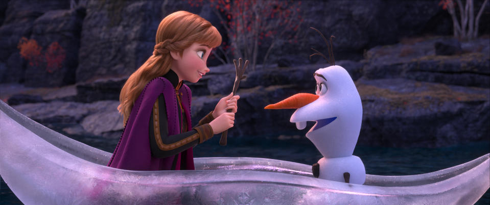 This image released by Disney shows Anna, voiced by Kristen Bell, left, and Olaf, voiced by Josh Gad, in a scene from "Frozen 2," in theaters on Nov. 22. (Disney via AP)