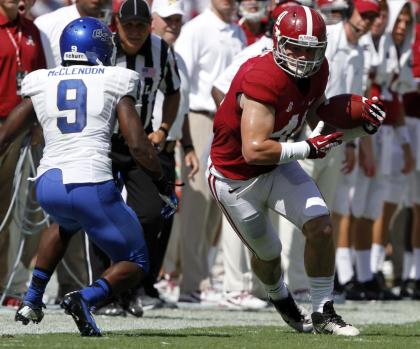 Alabama tight end Kurt Freitag (41) catches a pass for a first down against Georgia State during the second half of an NCAA college football game on Saturday, Oct. 5, 2013, in Tuscaloosa, Ala. (AP Photo/Butch Dill)