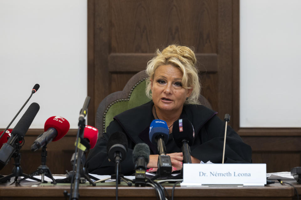 Judge Dr. Leona Németh speaks during the trial of the captain of a river cruise boat in Budapest, Hungary, Tuesday, Sept. 26, 2023. The captain of a river cruise boat that collided with another vessel in Hungary's capital in 2019, killing at least 27 mostly South Korean tourists has been found guilty of negligence and sentenced to five years and six months in prison. (AP Photo/Denes Erdos)