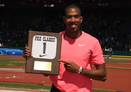 May 27, 2017; Eugene, OR, USA; Triple jump winner Christian Taylor (USA) poses with the Maria Mutola outstanding athlete award during the 43rd Prefontaine Classic at Hayward Field. Mandatory Credit: Kirby Lee-USA TODAY Sports