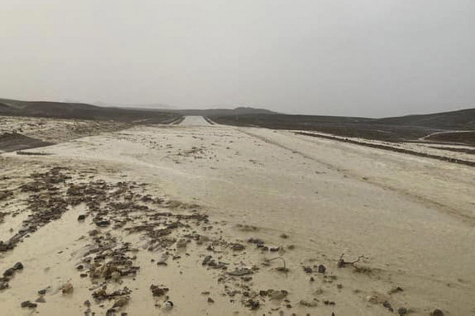 In this photo provided by the National Park Service, Highway 190 is closed due to flash flooding in Death Valley National Park, Calif., Friday, Aug. 5, 2022. Heavy rainfall triggered flash flooding that closed several roads in Death Valley National Park on Friday near the California-Nevada line. The National Weather Service reported that all park roads had been closed after 1 to 2 inches of rain fell in a short amount of time. (National Park Service via AP)