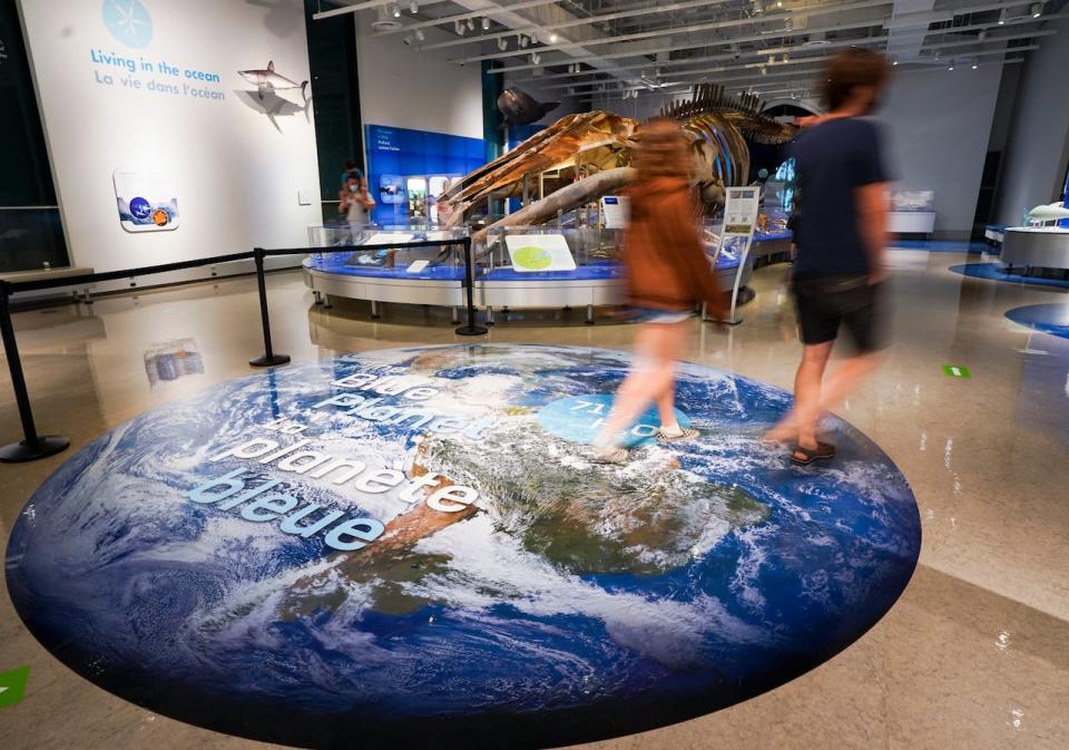 People visit the Canadian Museum of Nature in Ottawa on July 16, 2021, as Ontario enters Step 3 of its COVID-19 reopening plan.