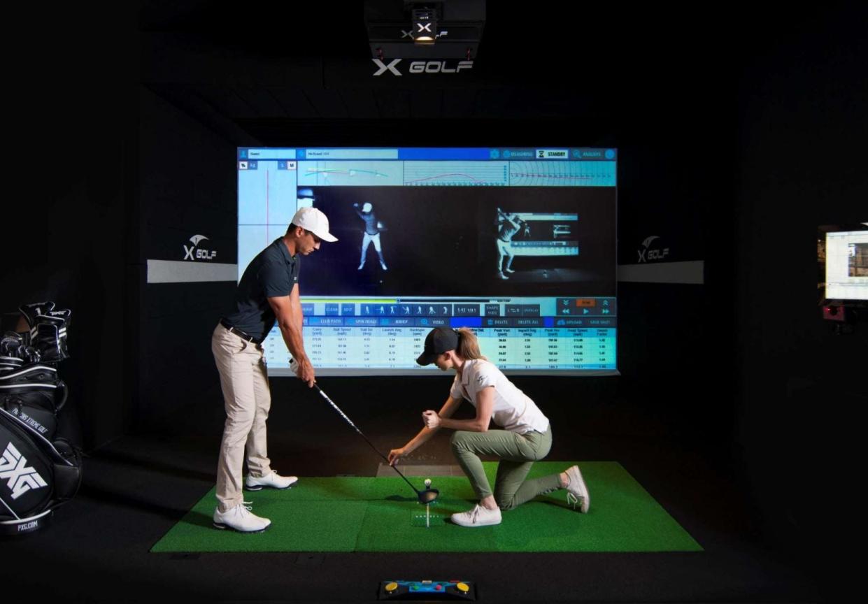 A screen capture from an X-Golf America presentation to the Hanover Select Board shows how the indoor golf simulator works.