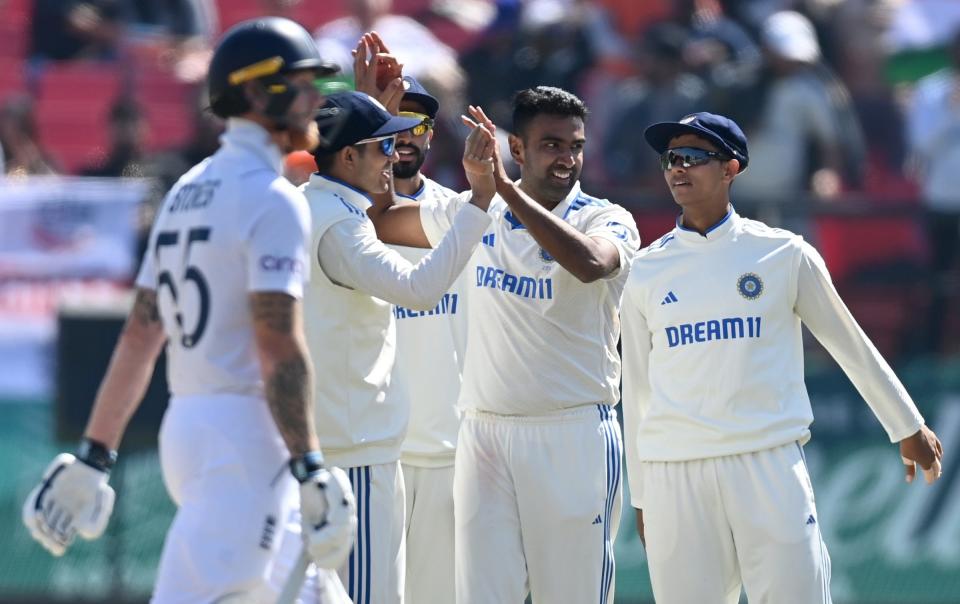 Ben Stokes (left) walks after being bowled by Ravichandran Ashwin in England's defeat by India