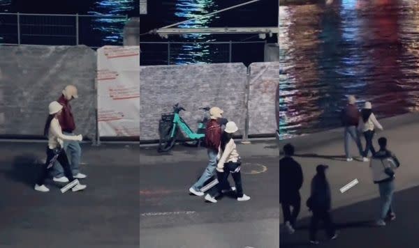 金泰亨與JENNI牽手漫步巴黎街頭，雖兩人都戴著帽子，但多處拍到JENNI的側臉，以及雙方經紀人隨行，更證實這段影片的真實性。（圖／翻攝自推特）