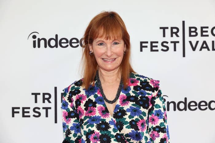 Woman smiling at Tribeca Festival in a floral jacket