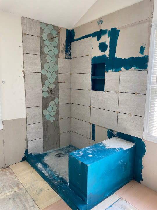 <strong><em>A photo showing Jacci Wallace’s bathroom as it was left by contractors working under Wood Construction. (Jacci Wallace)</em></strong>