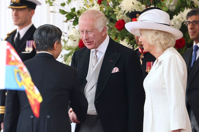 <p>Chris Jackson/Getty Images</p> King Charles and Queen Camilla greet Emperor Naruhito of Japan as he arrives with Empress Masako for the ceremonial welcome during the state visit on June 25, 2024.