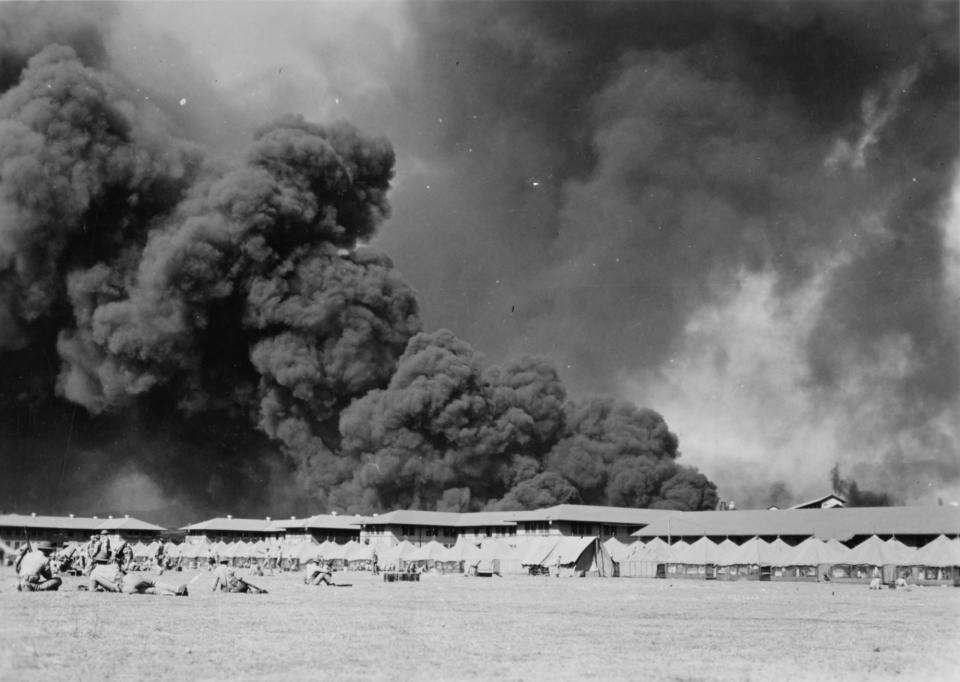 <p>U.S. Marines await the possible return of Japanese aircraft on the parade ground at the Pearl Harbor Marine Barracks on Dec. 7, 1941. (U.S. Naval History and Heritage Command/Handout via Reuters) </p>