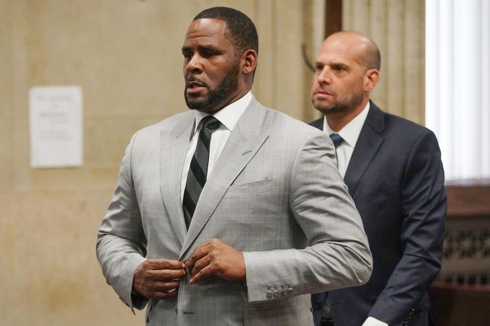 R. Kelly pleads not guilty to a new indictment before Judge Lawrence Flood at Leighton Criminal Court Building in Chicago on June 6, 2019. - R&amp;B star R. Kelly pleaded not guilty Thursday in a Chicago courtroom to 11 new felony sex crime charges. The charges were a refiling of one of the four cases of alleged abuse that prosecutors lodged against the singer earlier this year. (Photo by E. Jason Wambsgans / POOL / AFP) (Photo credit should read E. JASON WAMBSGANS/AFP via Getty Images)